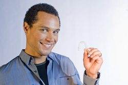 photo of man with invisalign appliance